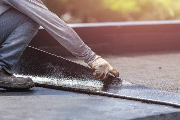 Professional Waterproofing technician working in White Plains, NC